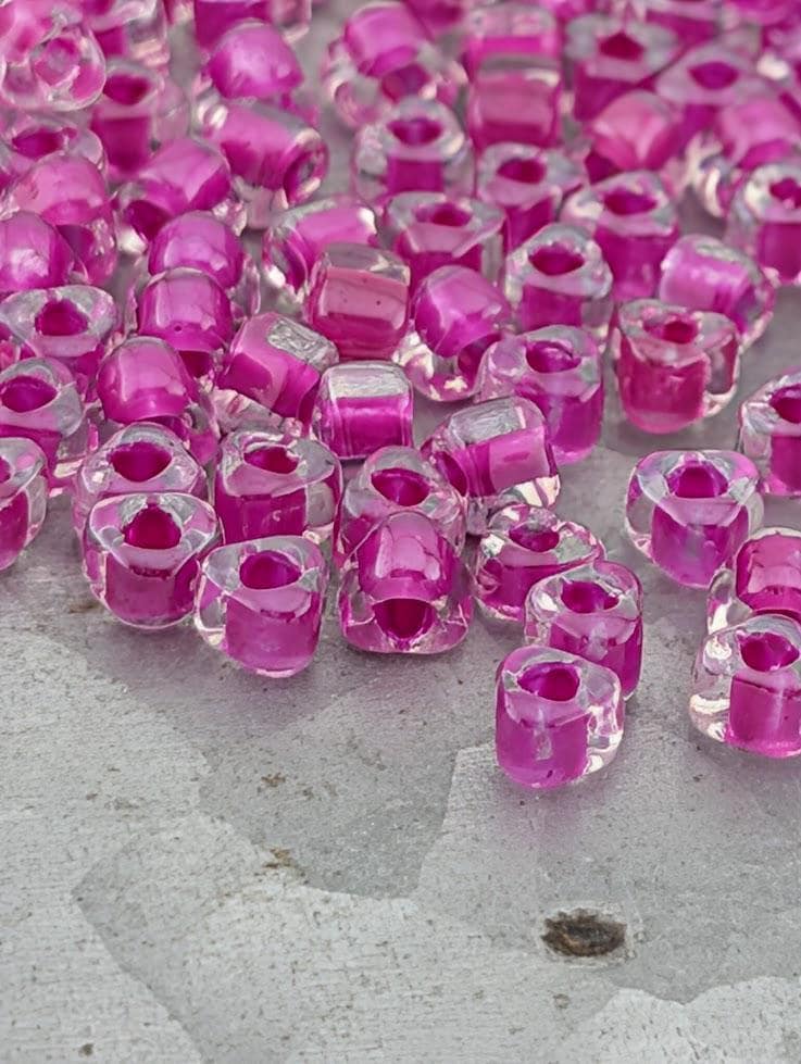 Crystal/Fuchsia Inside Color Lined Miyuki Triangle Size 5/0 (15g Pkg)