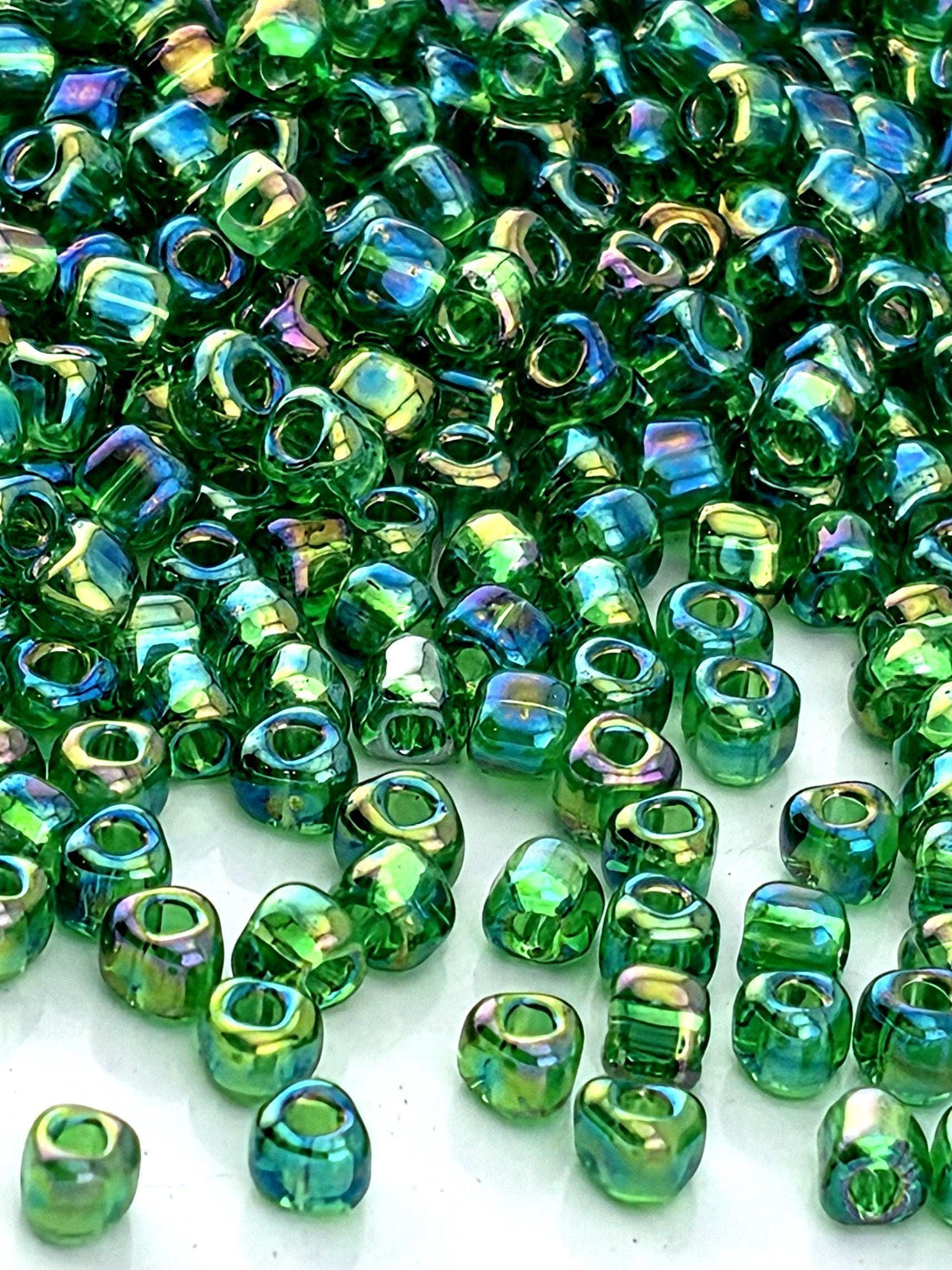 Medium Green Translucent Rainbow Miyuki Triangle Size 10/0 (15g Pkg)