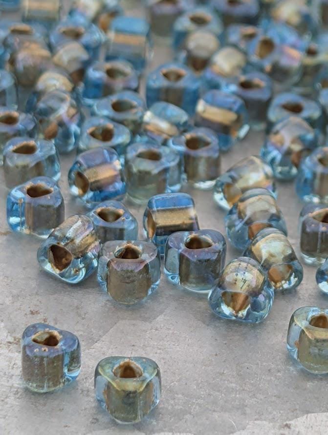Blue/Bronze Inside Color Lined Sparkle Miyuki Triangle Size 5/0 (15g Pkg)