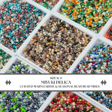 a variety of colorful beads in different shapes and sizes, arranged in multiple containers.