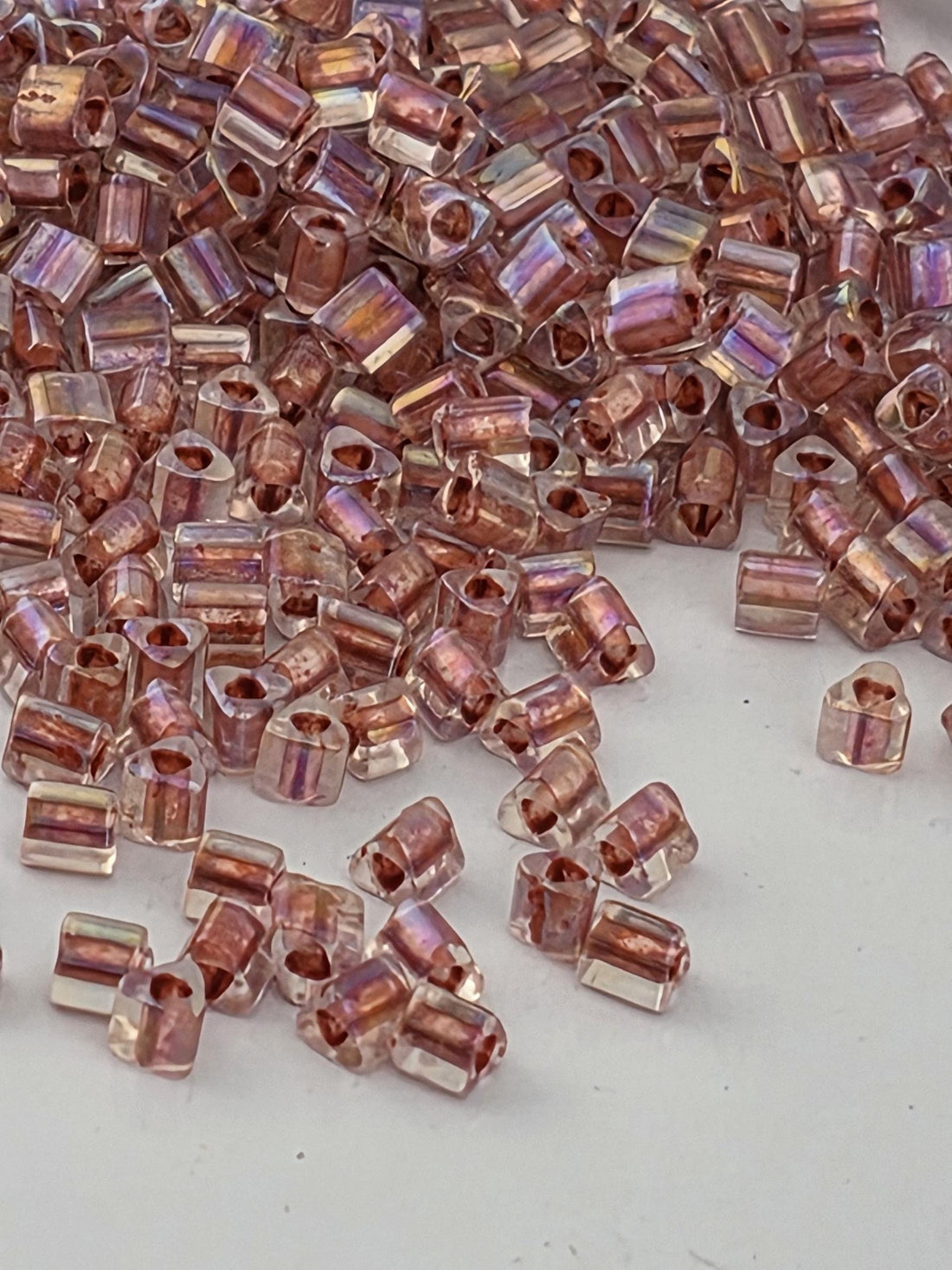 TOHO Triangle 11/0 Inside-Color Rainbow Crystal/Sandstone-Lined 2.5 Tube