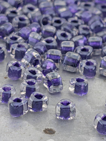 Crystal/Dark Purple Inside Color Lined Sparkle Miyuki Triangle Size 5/0 (15g Pkg)