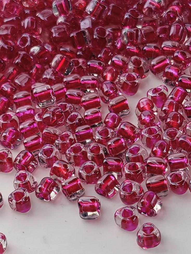 Crystal/Raspberry Inside Color Lined Miyuki Triangle Size 8/0 (15g Pkg)