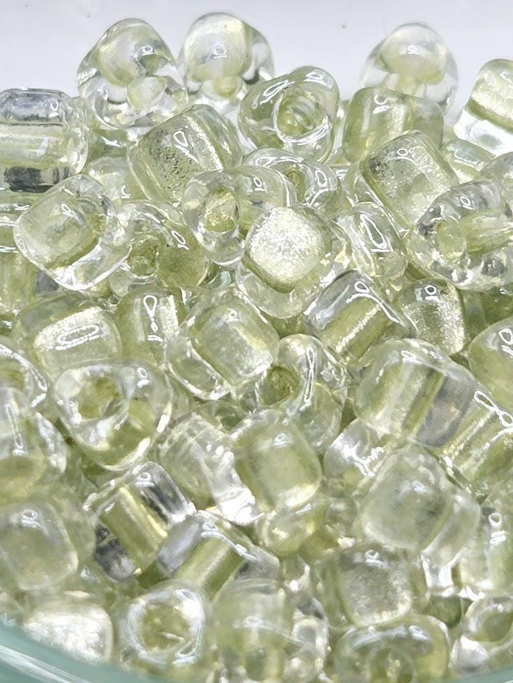 Crystal/Light Celery Inside Color Lined Sparkle Miyuki Triangle Size 5/0 (15g Pkg)