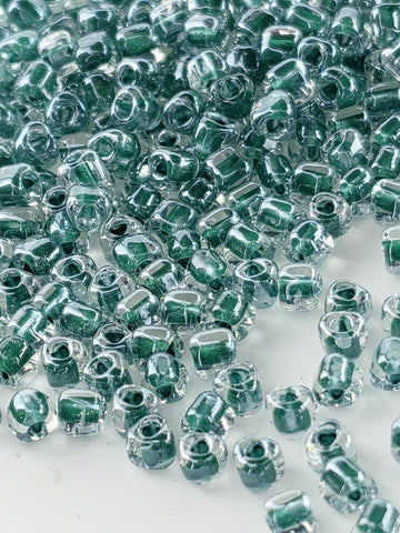 Crystal/Hunter Green Inside Color Lined Sparkle Miyuki Triangle Size 8/0 (15g Pkg)