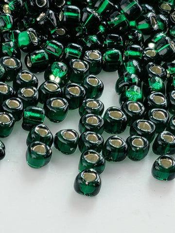 Emerald Green Translucent Silver Lined Miyuki Triangle Size 8/0 (15g Pkg)