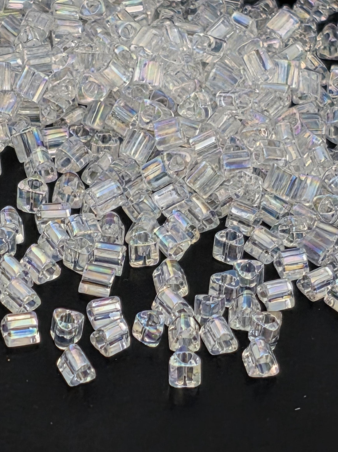 TOHO Triangle 11/0 Transparent-Rainbow Crystal 2.5 Tube