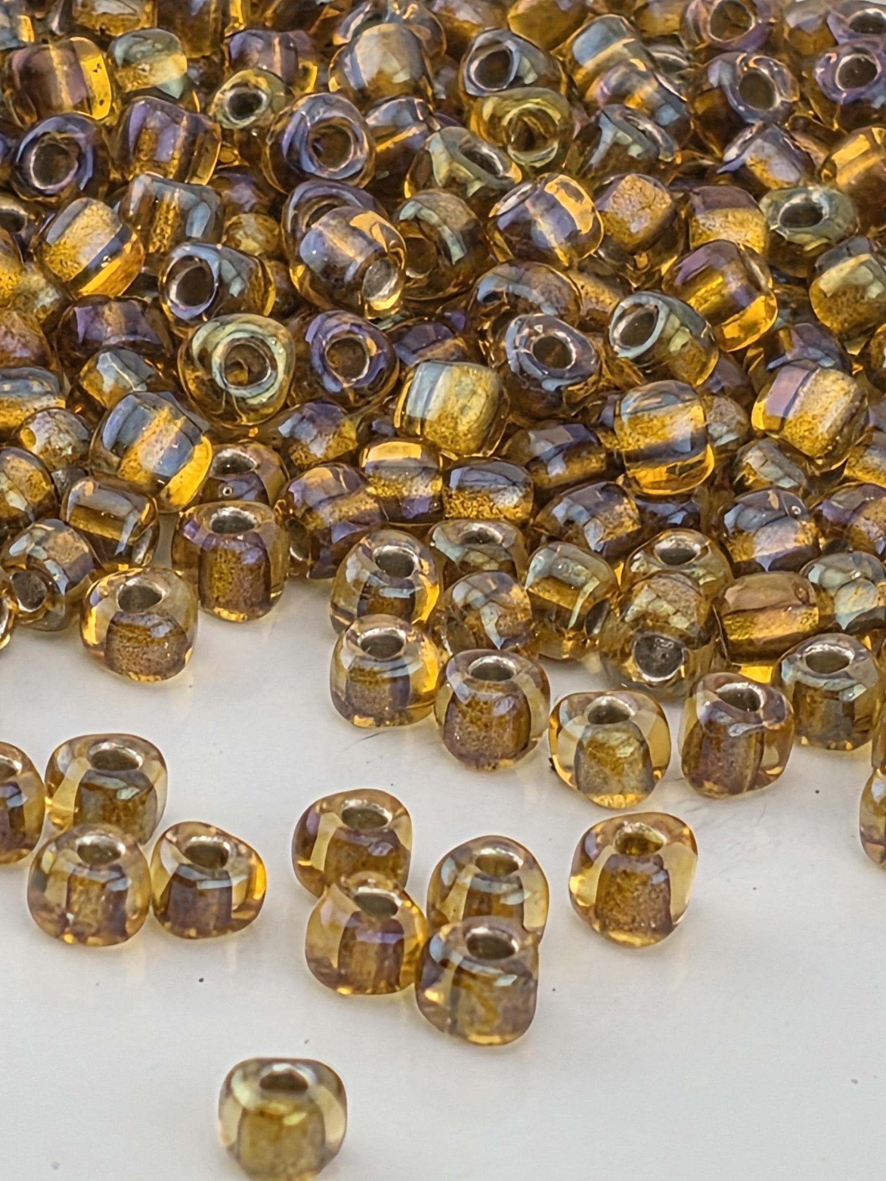 Amber/Amber Inside Color Lined Sparkle Miyuki Triangle Size 8/0 (15g Pkg)