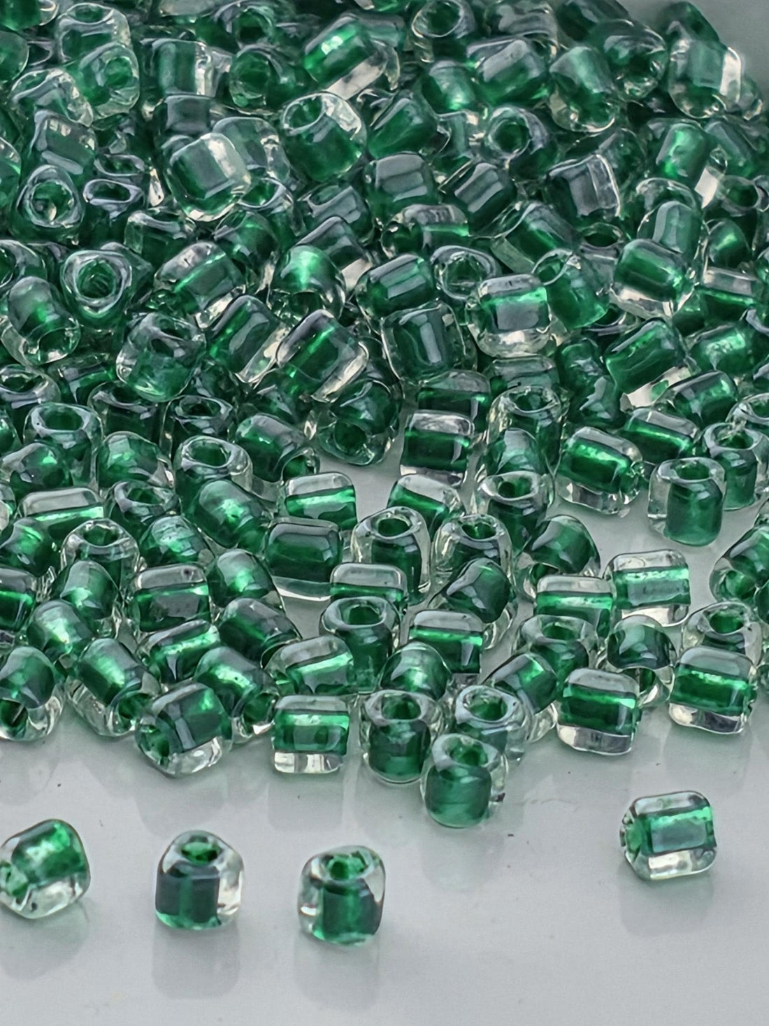 Crystal/Green Inside Color Lined Miyuki Triangle Size 10/0 (15g Pkg)