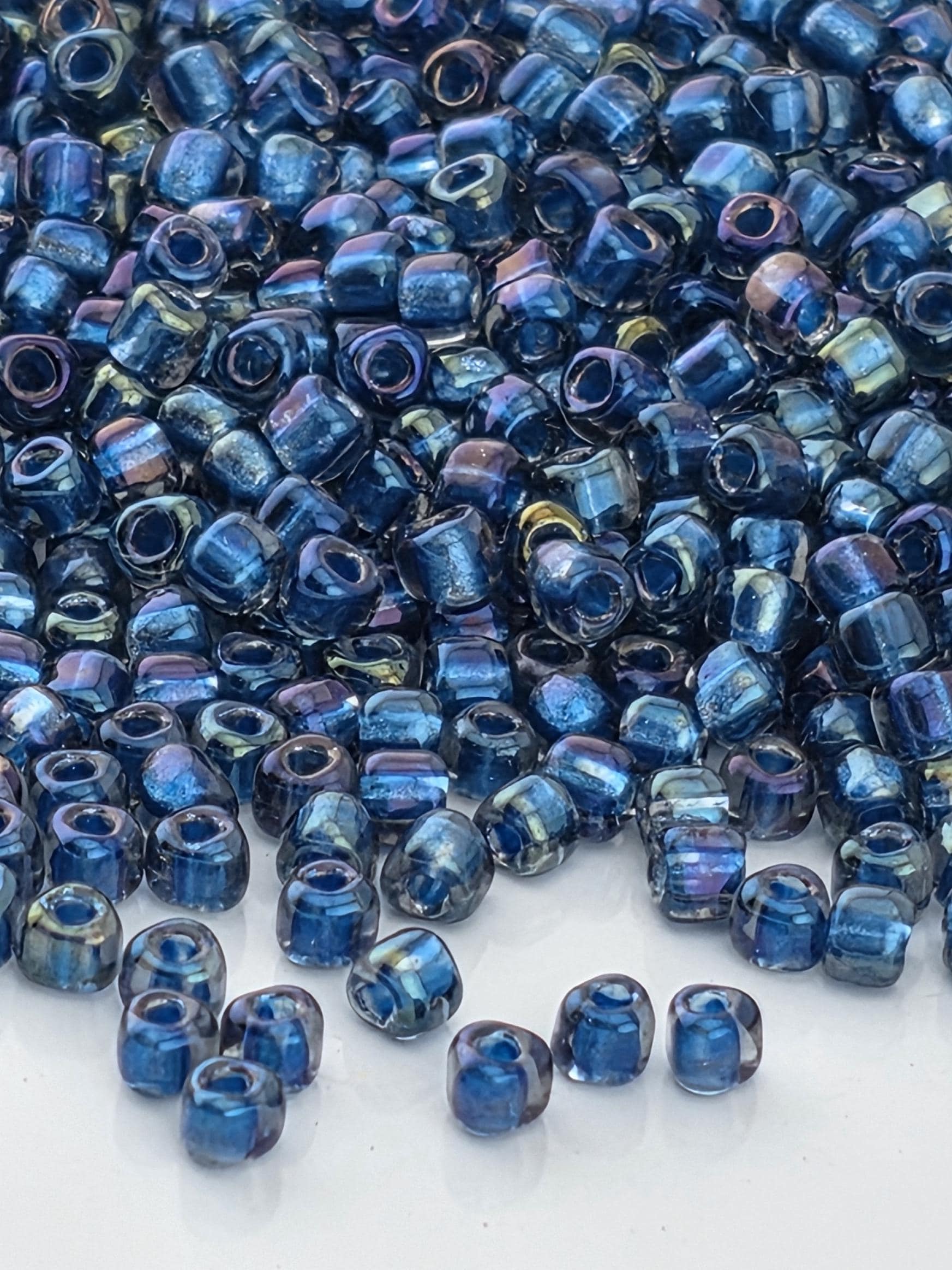 Lt Blue/Midnight Blue Inside Color Lined Sparkle Miyuki Triangle Size 10/0 (15g Pkg)