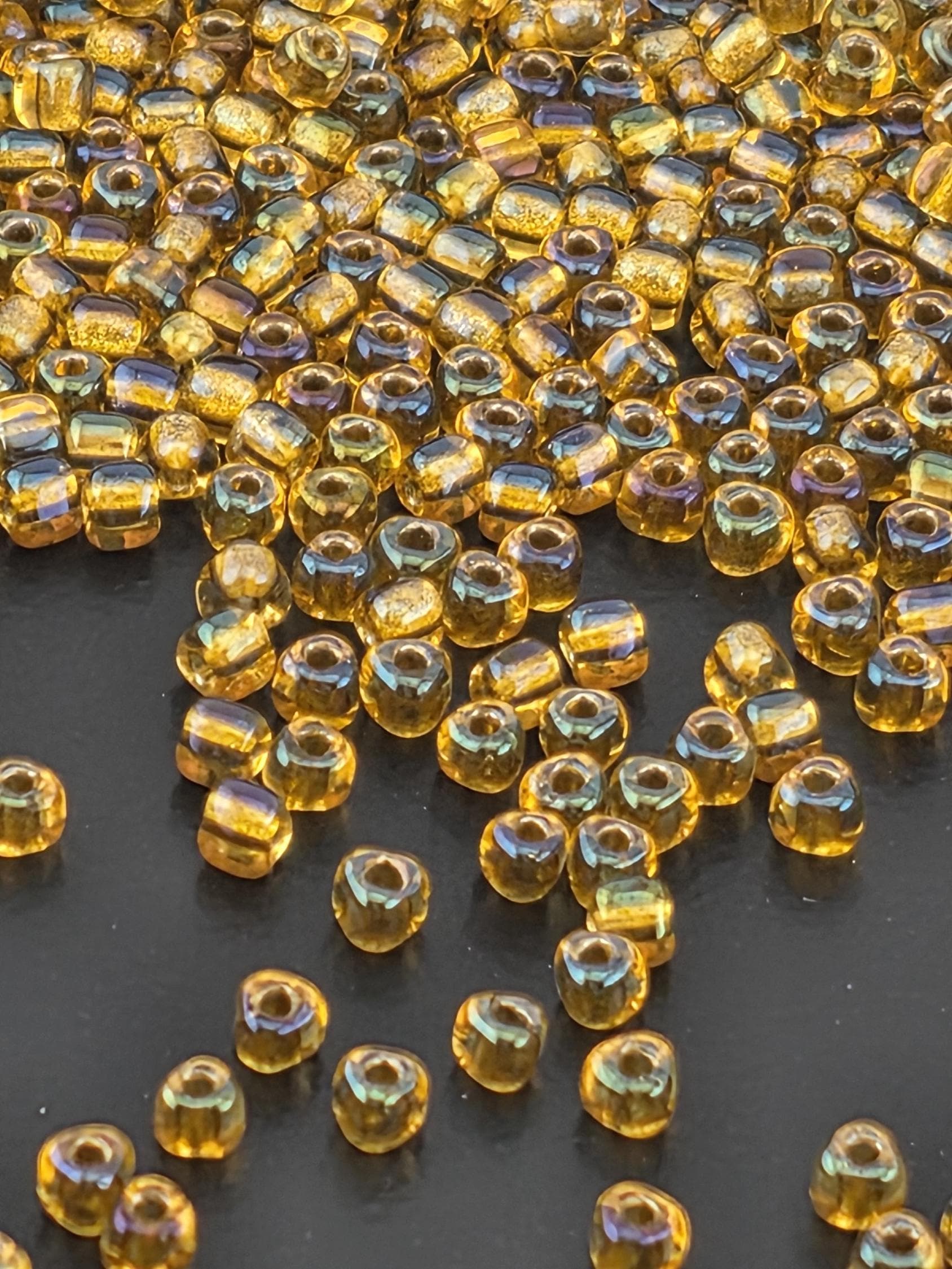 Amber/Amber Inside Color Lined Sparkle Miyuki Triangle Size 10/0 (15g Pkg)