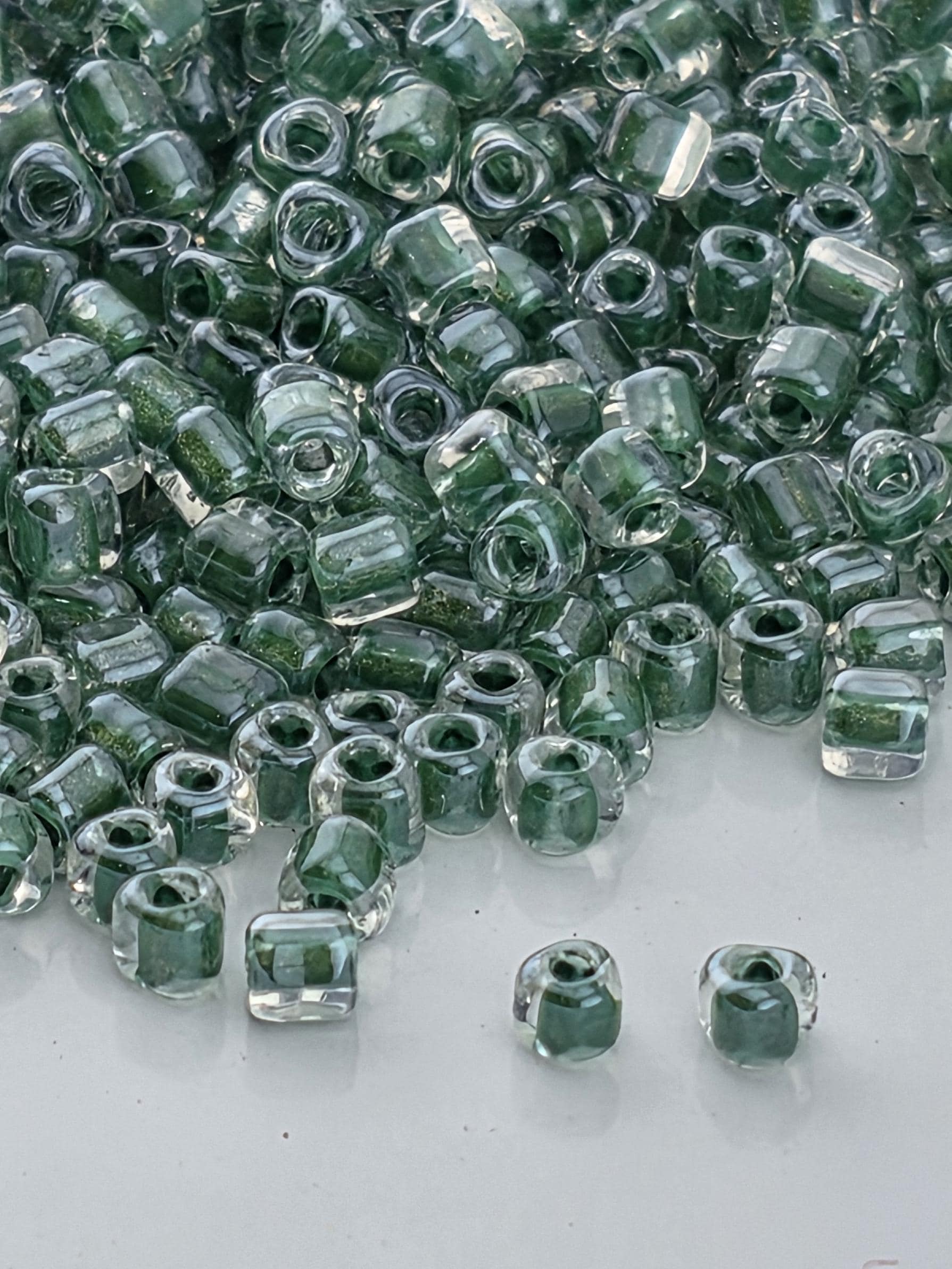 Crystal/Hunter Green Inside Color Lined Sparkle Miyuki Triangle Size 10/0 (15g Pkg)