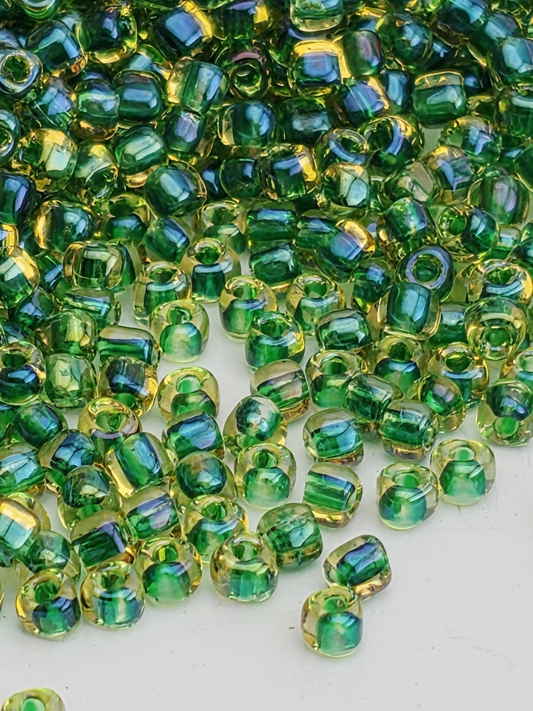 10TR1165-Miyuki Triangle Beads:Amber/Green ICL (15g pkg)