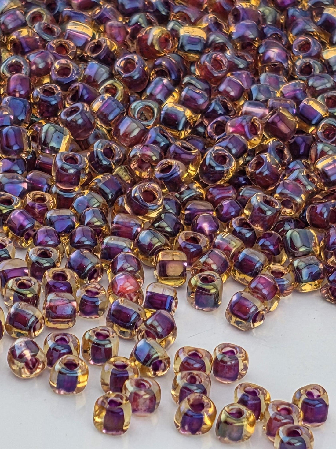 Amber/Amethyst Inside Color Lined Miyuki Triangle Size 10/0 (15g Pkg)