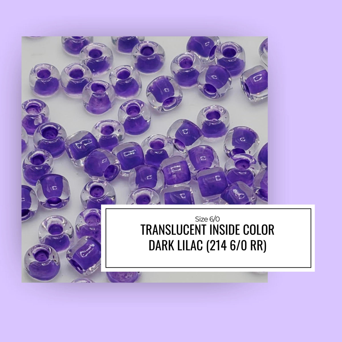 a collection of clear glass beads in various shades of purple, arranged in a visually appealing manner.