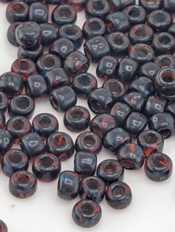 Toho Japanese Seed Beads: Hybrid Frosted Siam Ruby Picasso , 6/0 | Round Glass | 2.5" Tube