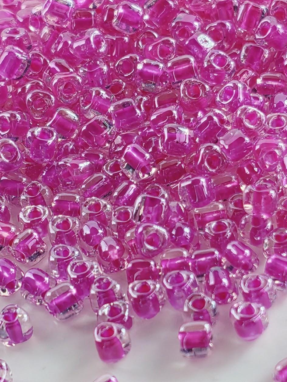 Miyuki Triangle Beads, Crystal/Fuchsia Inside Color Lined | 8/0 Size | 15g Pack