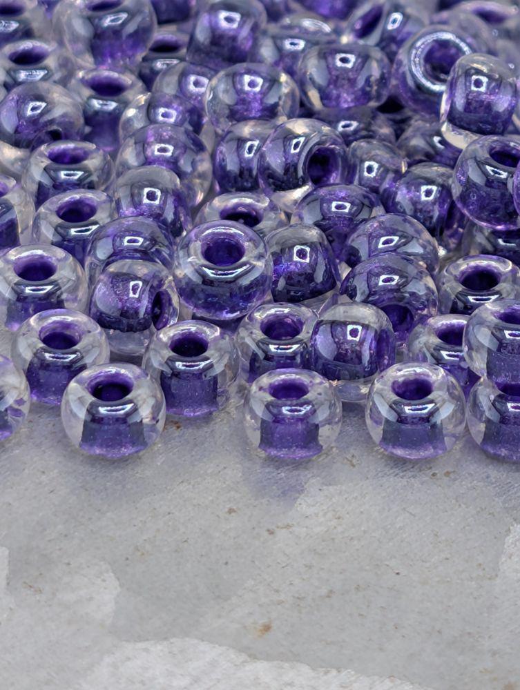 Crystal/Dark Purple Inside Color Lined Rocaille | 6/0 | Miyuki - 15g pkg
