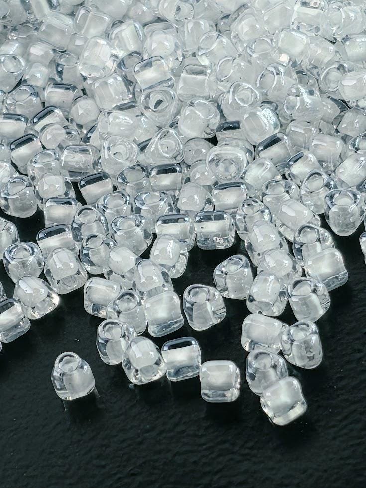 Crystal/White Inside Color Lined | Triangle Size 8/0 | Miyuki | 15g Pkg