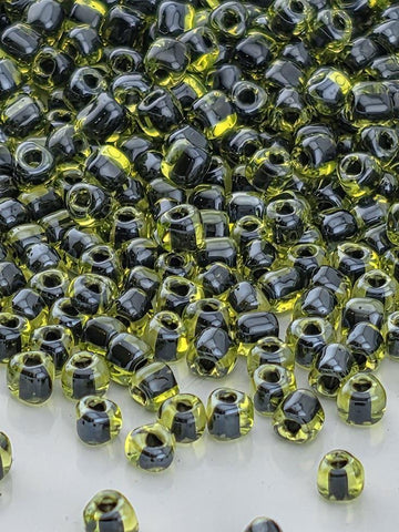 Peridot/Black Inside Color Lined | Triangle Size 10/0 | Miyuki | 15g Pkg