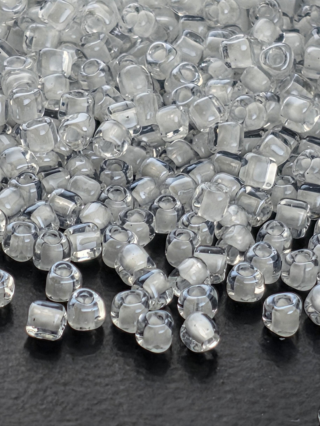 Miyuki Triangle Beads, Crystal White Inside Color Lined | 10/0 Size | 15g Pack