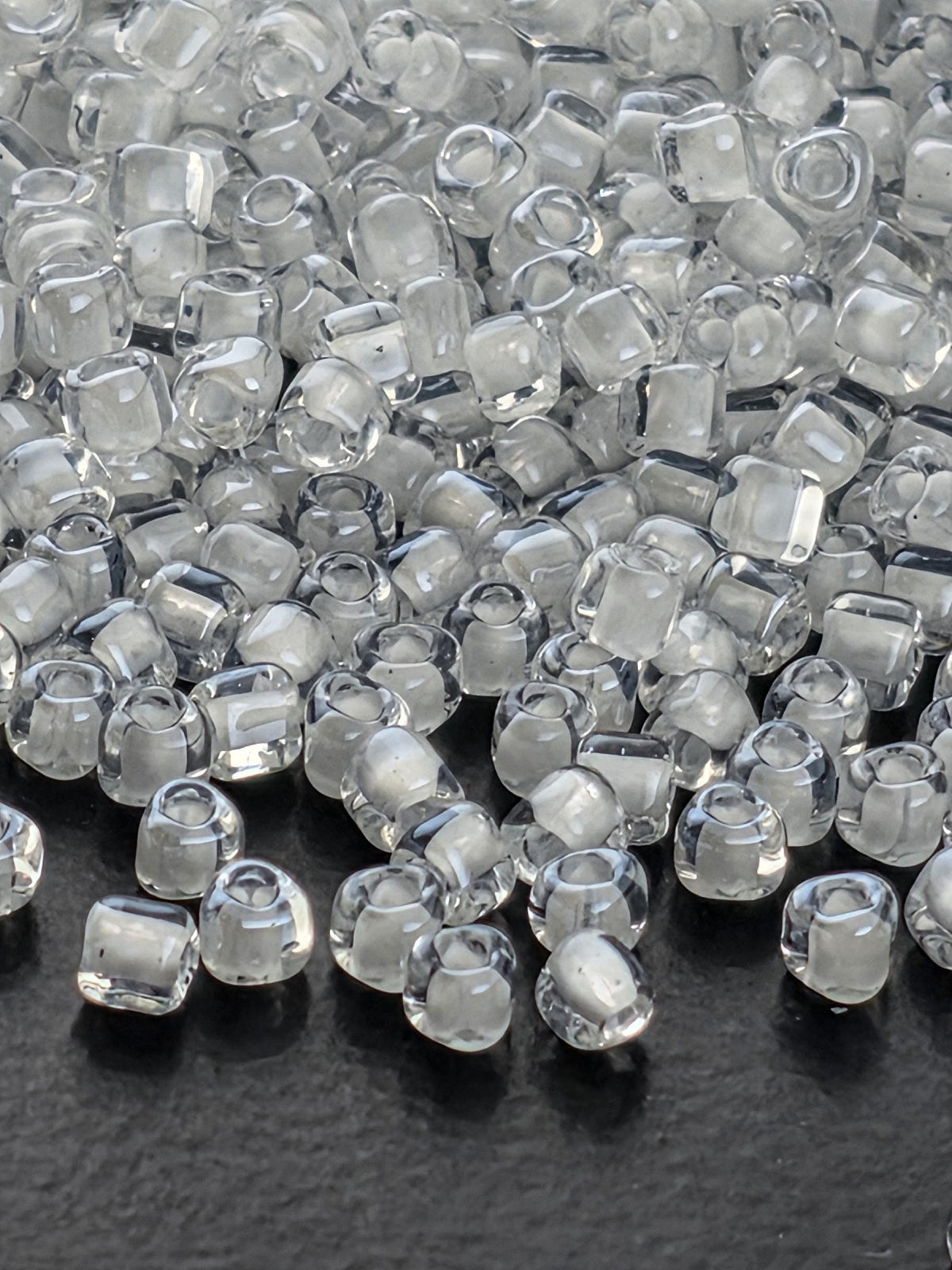 Miyuki Triangle Beads, Crystal White Inside Color Lined | 10/0 Size | 15g Pack