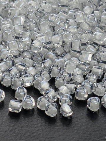 Miyuki Triangle Beads, Crystal White Inside Color Lined | 10/0 Size | 15g Pack
