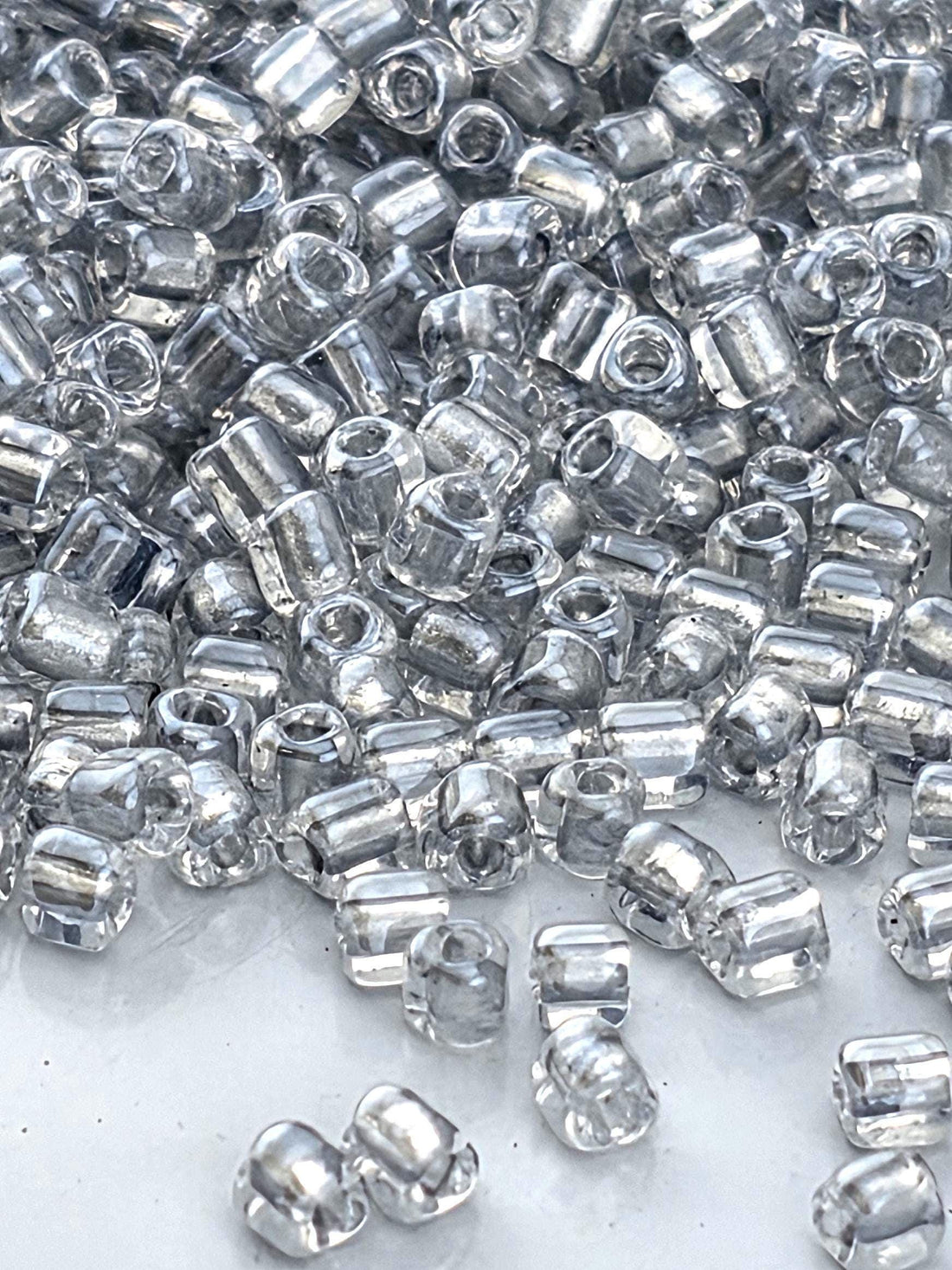 Miyuki Triangle Beads, Crystal Silver Inside Color Lined | Japanese Glass | 10/0 Size, 15g