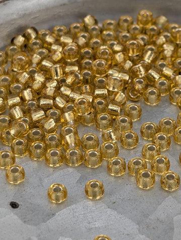 Gold Transparent Silver Lined Rocaille | 6/0 | Miyuki - 15g pkg