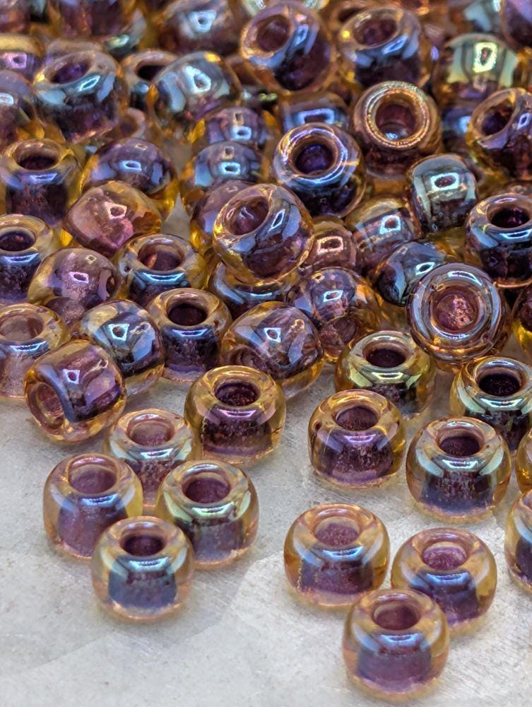 Amber/Amethyst Inside Color Lined Rocaille | 6/0 | Miyuki - 15g pkg