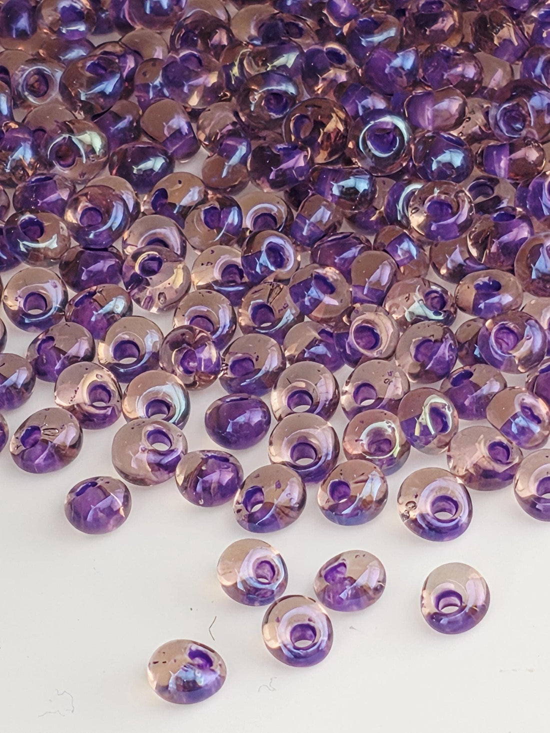 TOHO Magatama 3mm Tube 2.5" : Inside-Color Rainbow Rosaline/Opaque Purple-Lined