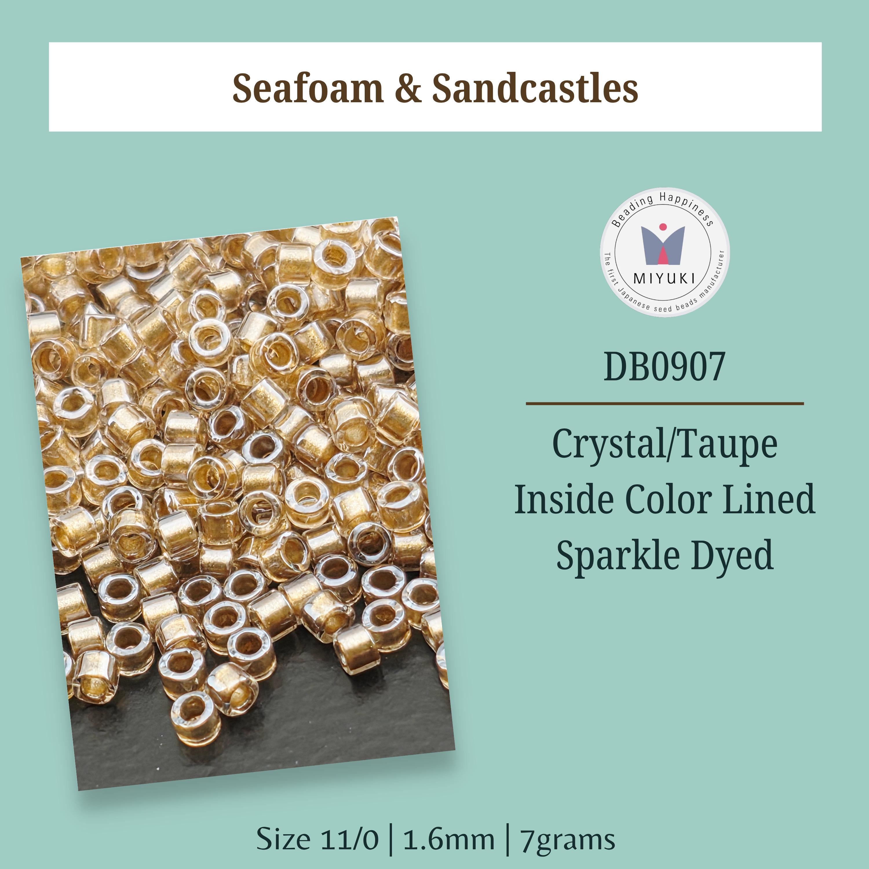 a collection of gold-colored beads, which appear to be crystal or taupe-insulated and lined with color. The beads are described as being inside a color-lined sparkly dye.