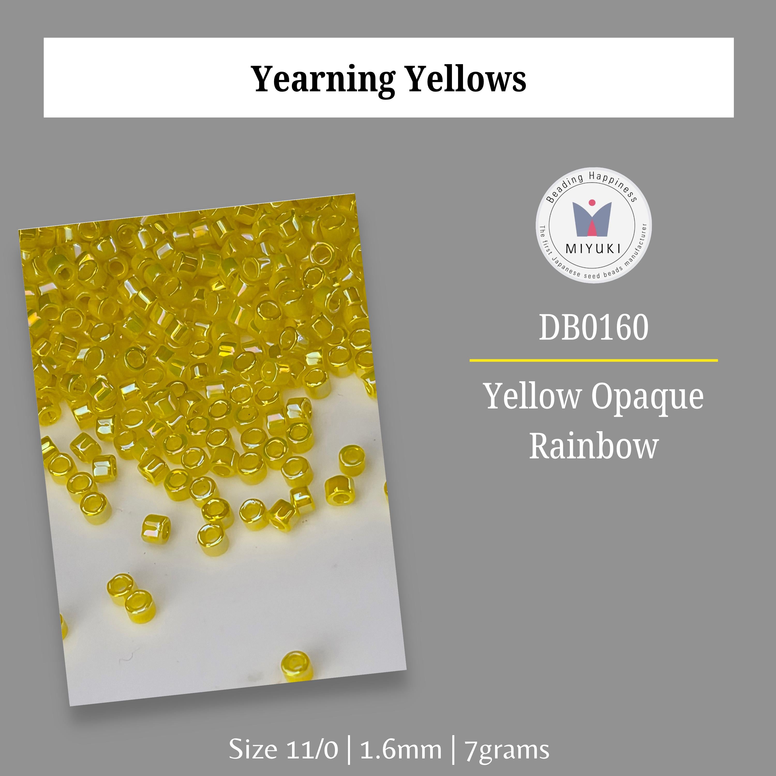 a collection of yellow opaqueness rainbow beads, with a focus on the yellow opaqueness of the beads.