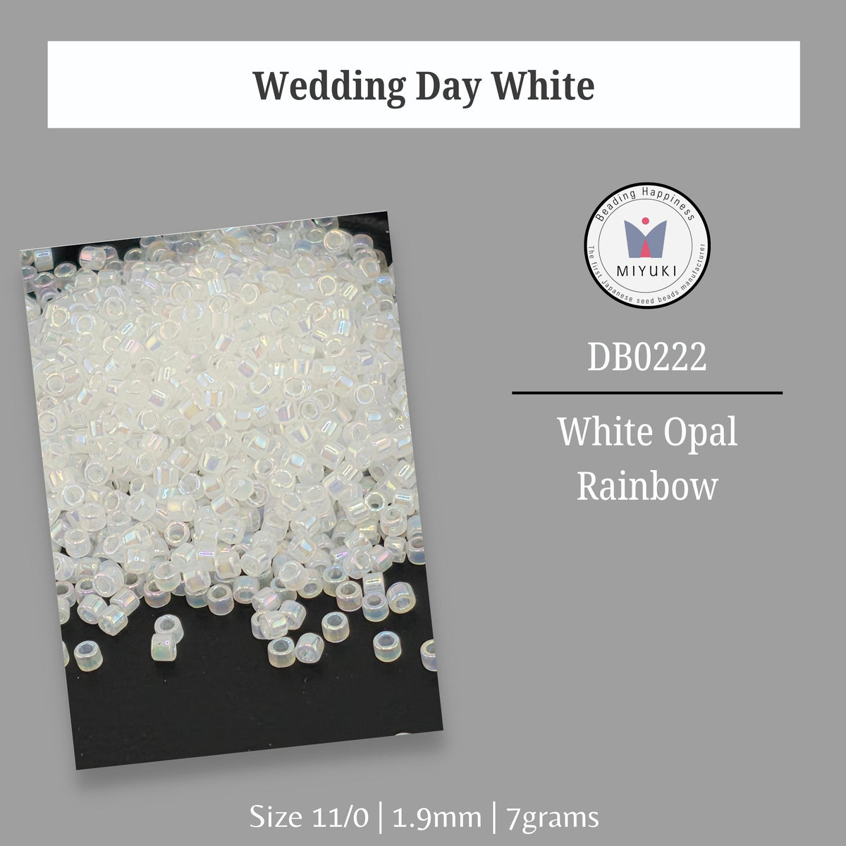 a pile of white opal beads, specifically white opal rainbow beads, against a black background.