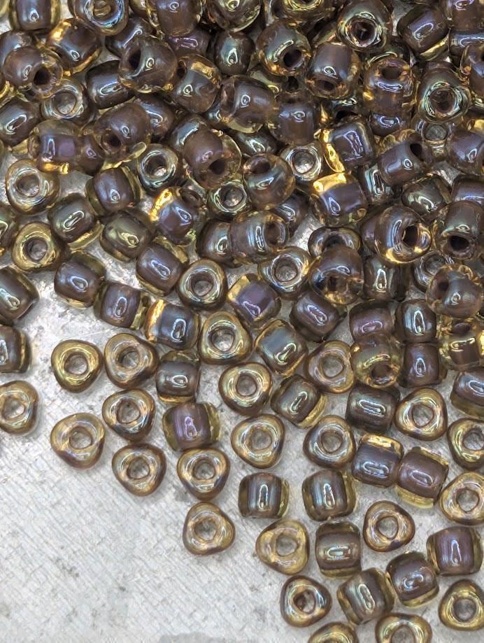 Miyuki Triangle Beads, Amber Brown Inside Color Lined | 10/0 Size | 15g Pack