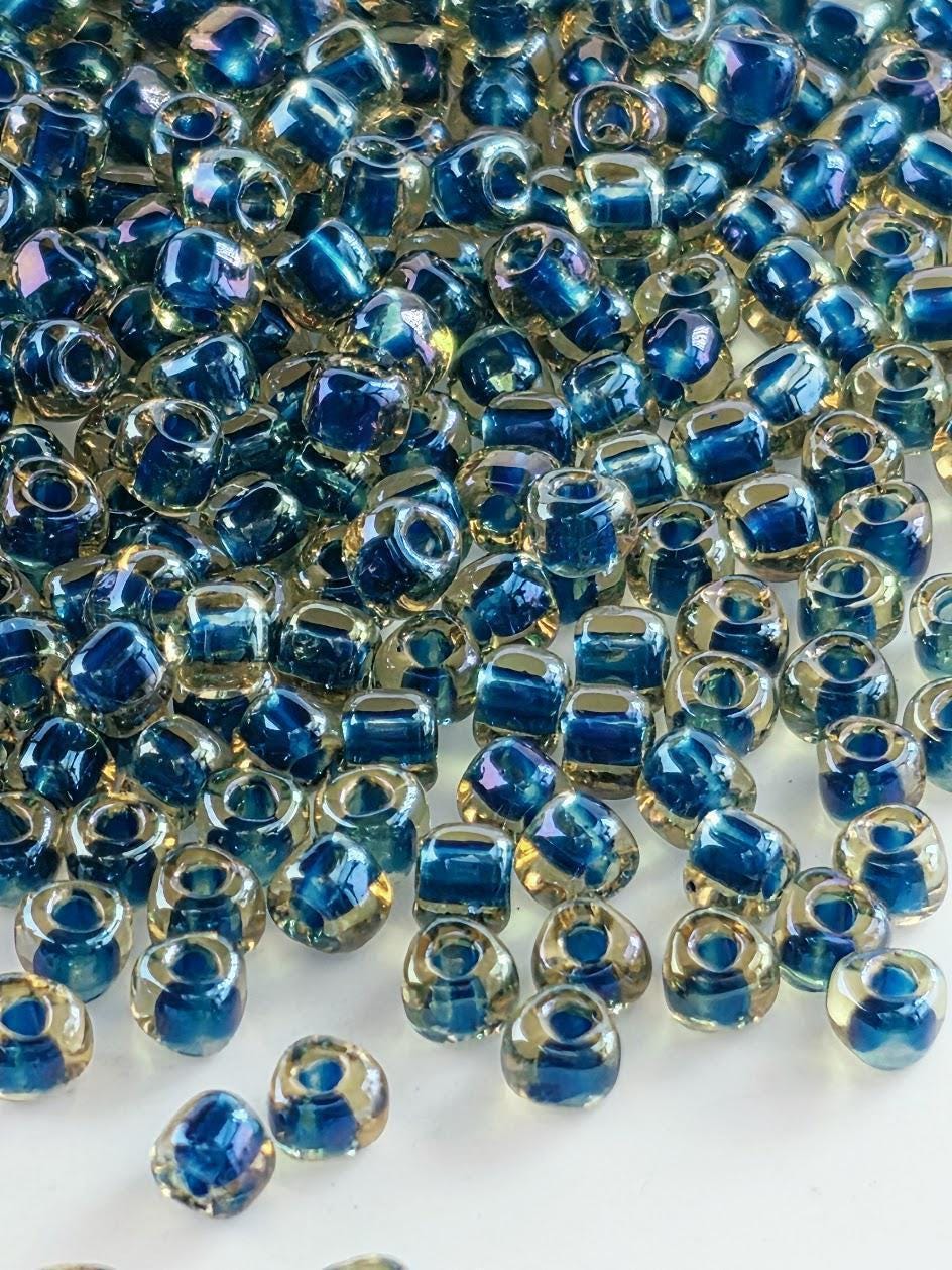 Amber/Dark Teal Inside Color Lined | Triangle Size 8/0 | Miyuki | 15g Pkg