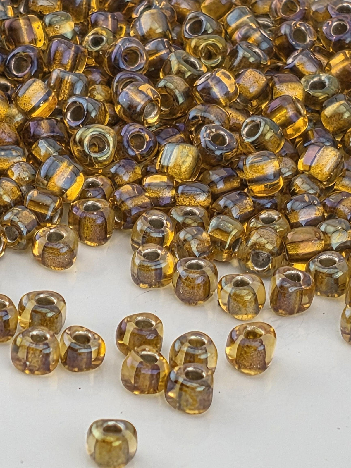 Miyuki Triangle Beads, Amber Inside Color Lined Sparkle | Size 8/0 | 15g