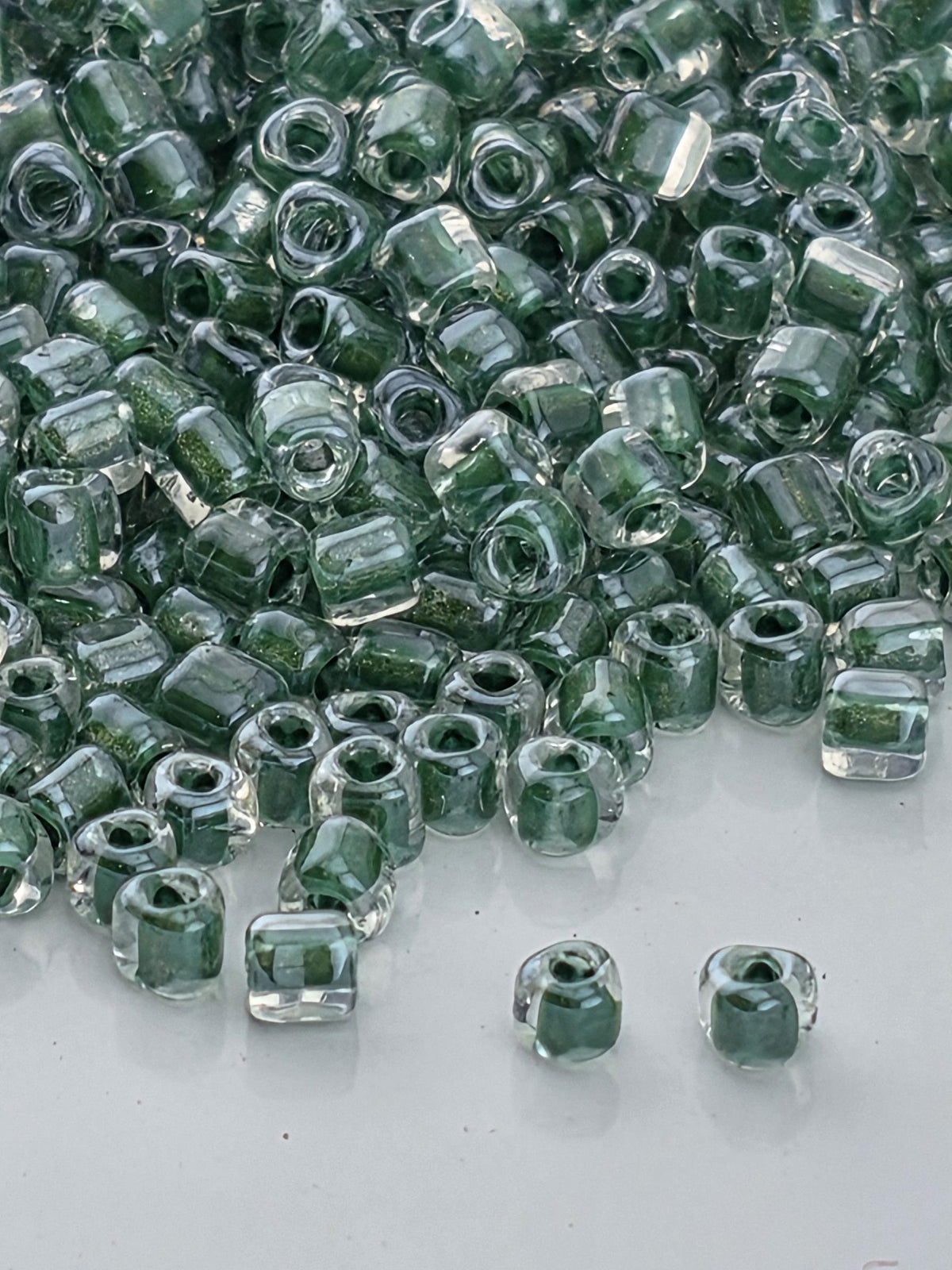 Miyuki Triangle Beads, Crystal-Hunter Green Inside Color Lined | 10/0 | 15g