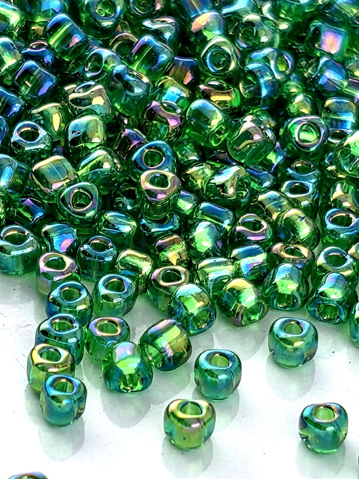 Miyuki Triangle Beads, Kelly Green Translucent Rainbow | Japanese Glass | 10/0 Size