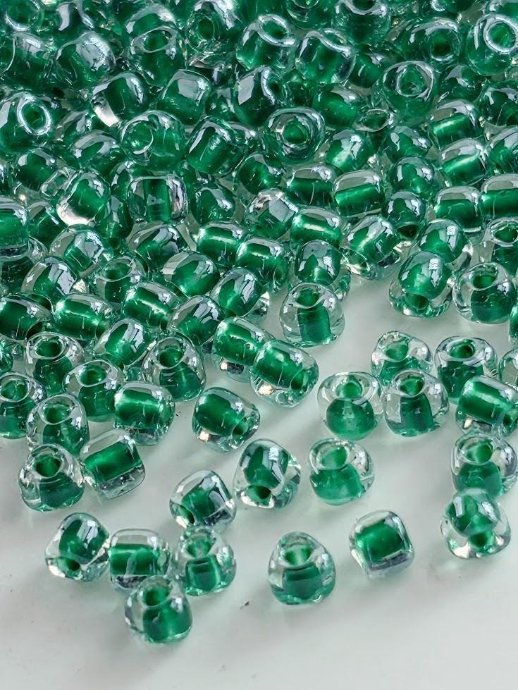 Miyuki Triangle Beads, Crystal Green Inside Color Lined | 8/0 Size | 15g Pack