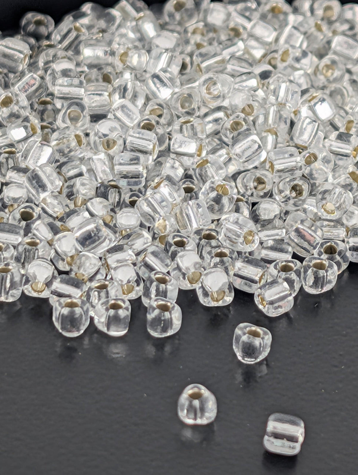 Crystal Translucent Silver Lined | Triangle Size 8/0 | Miyuki | 15g Pkg