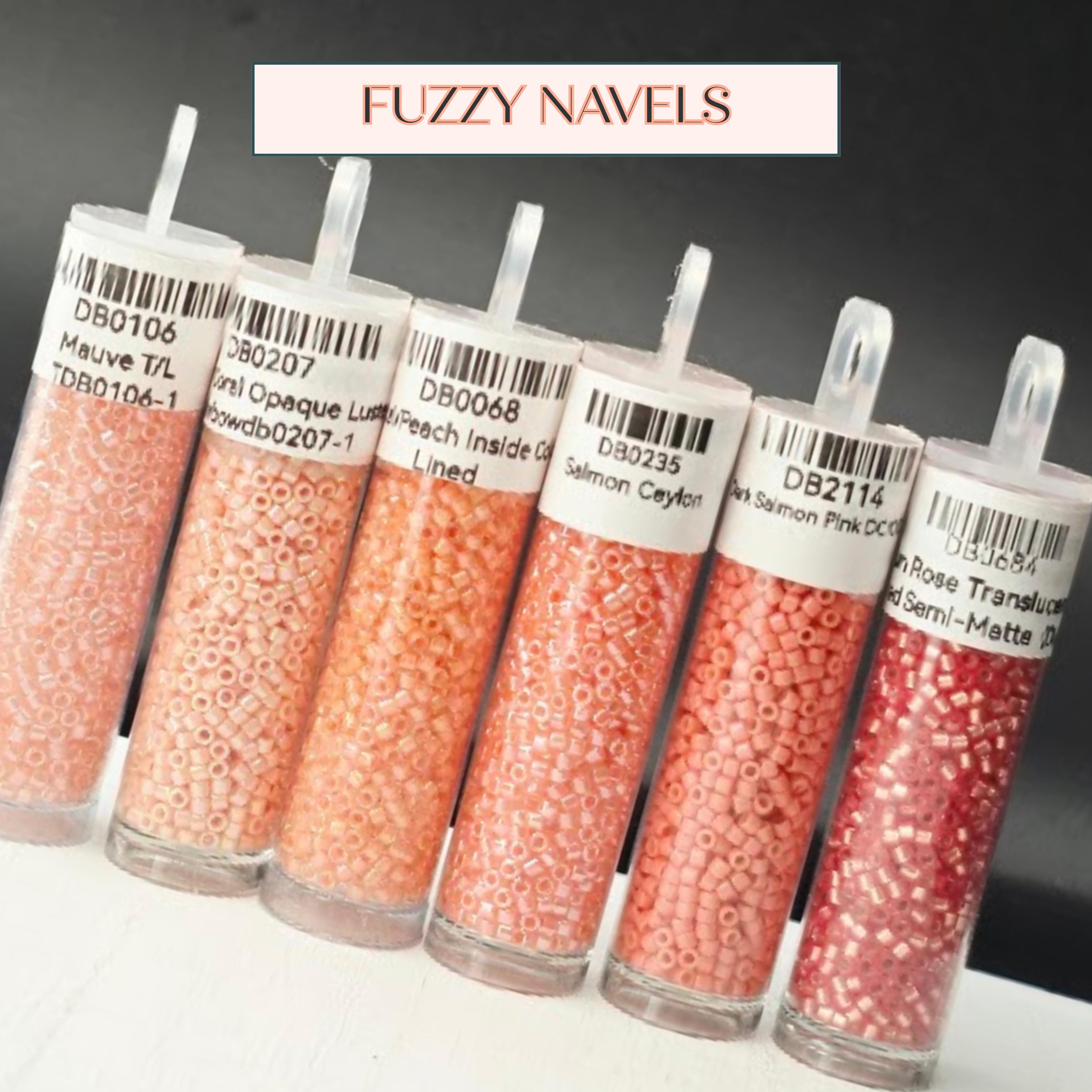 a collection of six glass jars filled with different colored beads, arranged in a row.