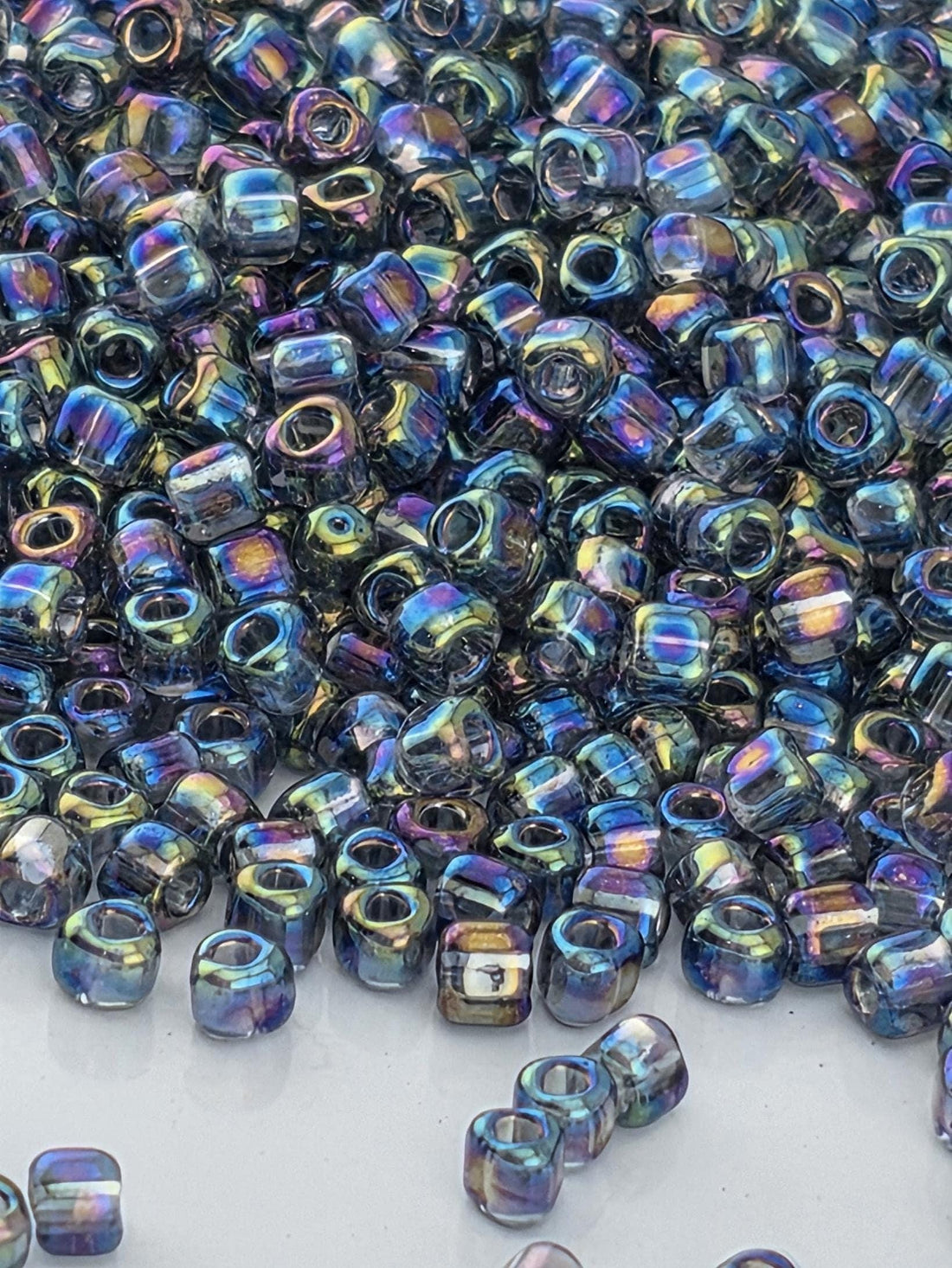 Miyuki Triangle Beads, Smoky Grey Translucent Rainbow | 10/0 | 15g Pack