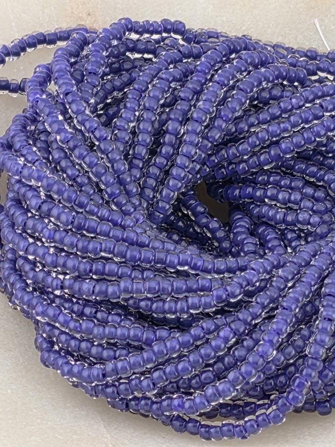 Transparent Terra Intensive Crystal Lined Violet | Size 8 | Half-Hank (12" 6-String) | Preciosa-Ornela Glass Seed Beads