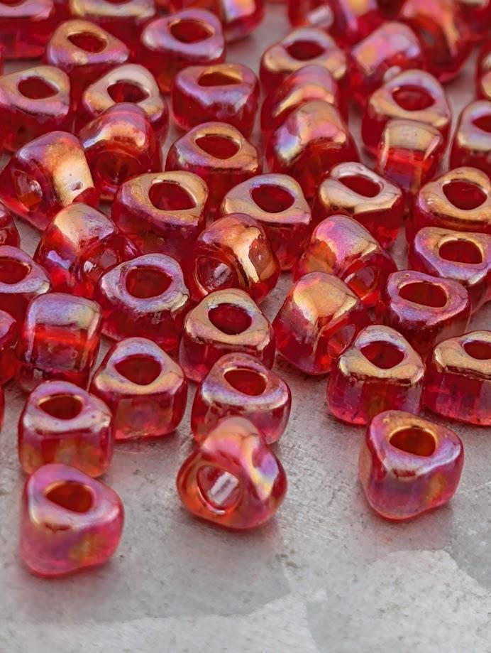 Miyuki Triangle Beads, Berry Red Translucent Rainbow | 5/0 | 15g Pack