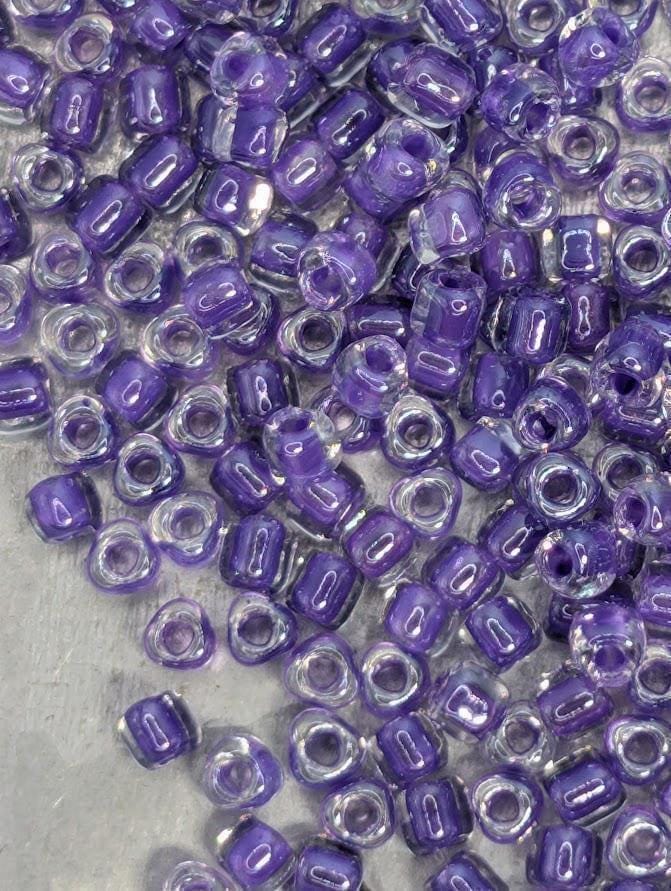 Miyuki Triangle Beads, Crystal Purple Inside Color Lined | 8/0 | 15g