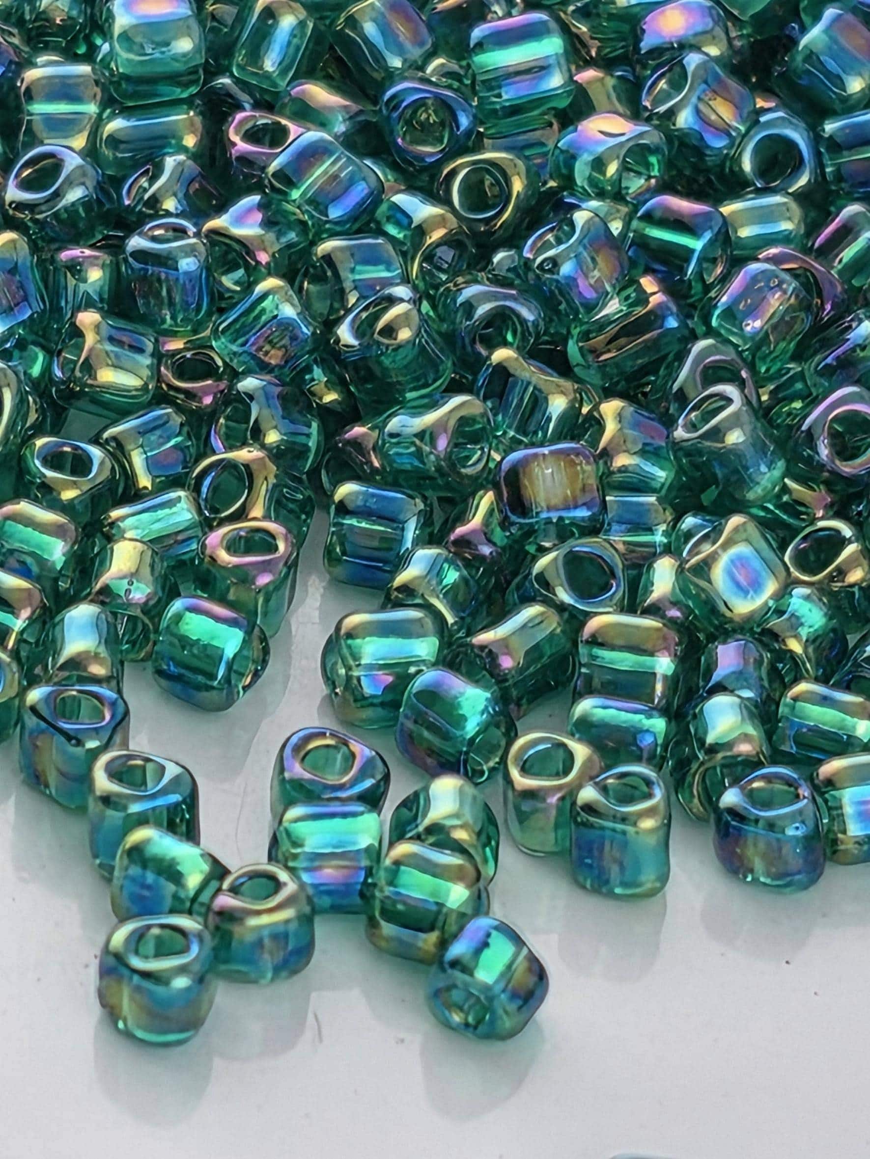 Miyuki Triangle Beads, Med Green Inside Color Lined Sparkle | 10/0 | 15g