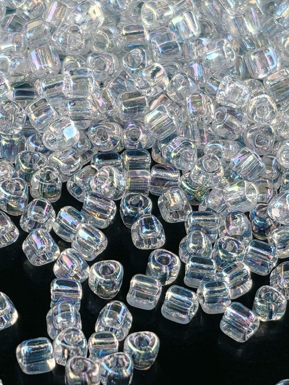 Miyuki Triangle Beads, Crystal Translucent Rainbow | 8/0 | 15g Pack