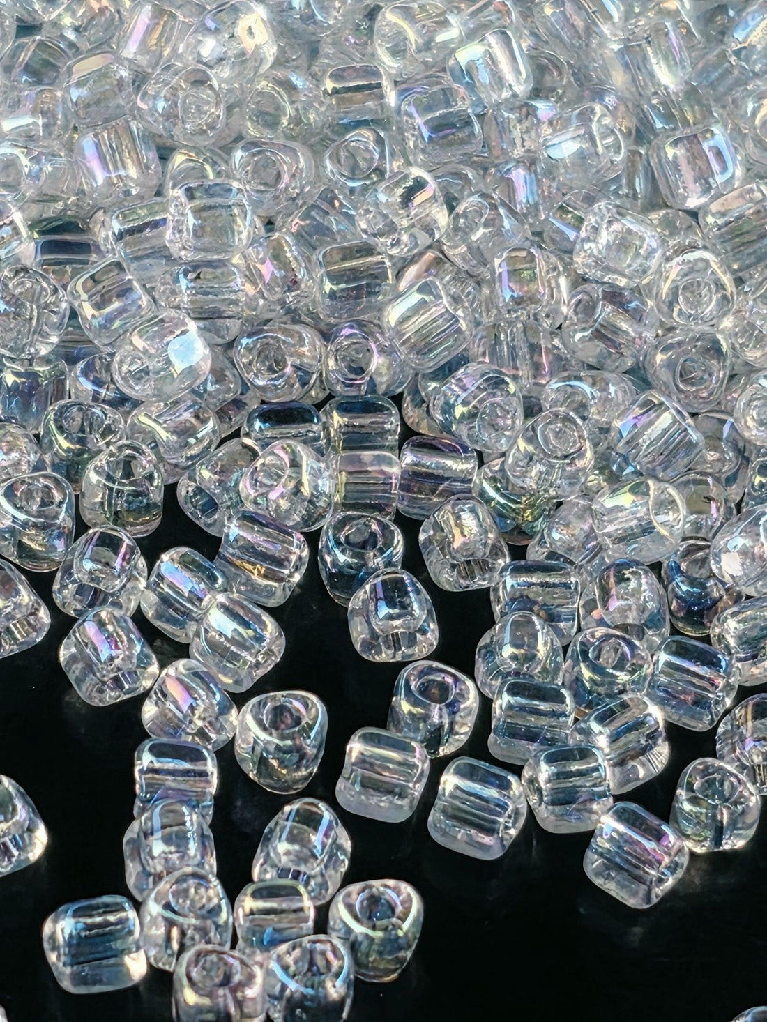 Miyuki Triangle Beads, Crystal Translucent Rainbow | 8/0 | 15g Pack