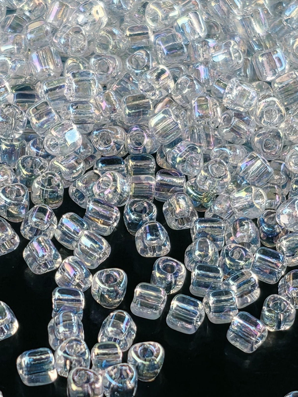 Miyuki Triangle Beads, Crystal Translucent Rainbow | 8/0 | 15g Pack
